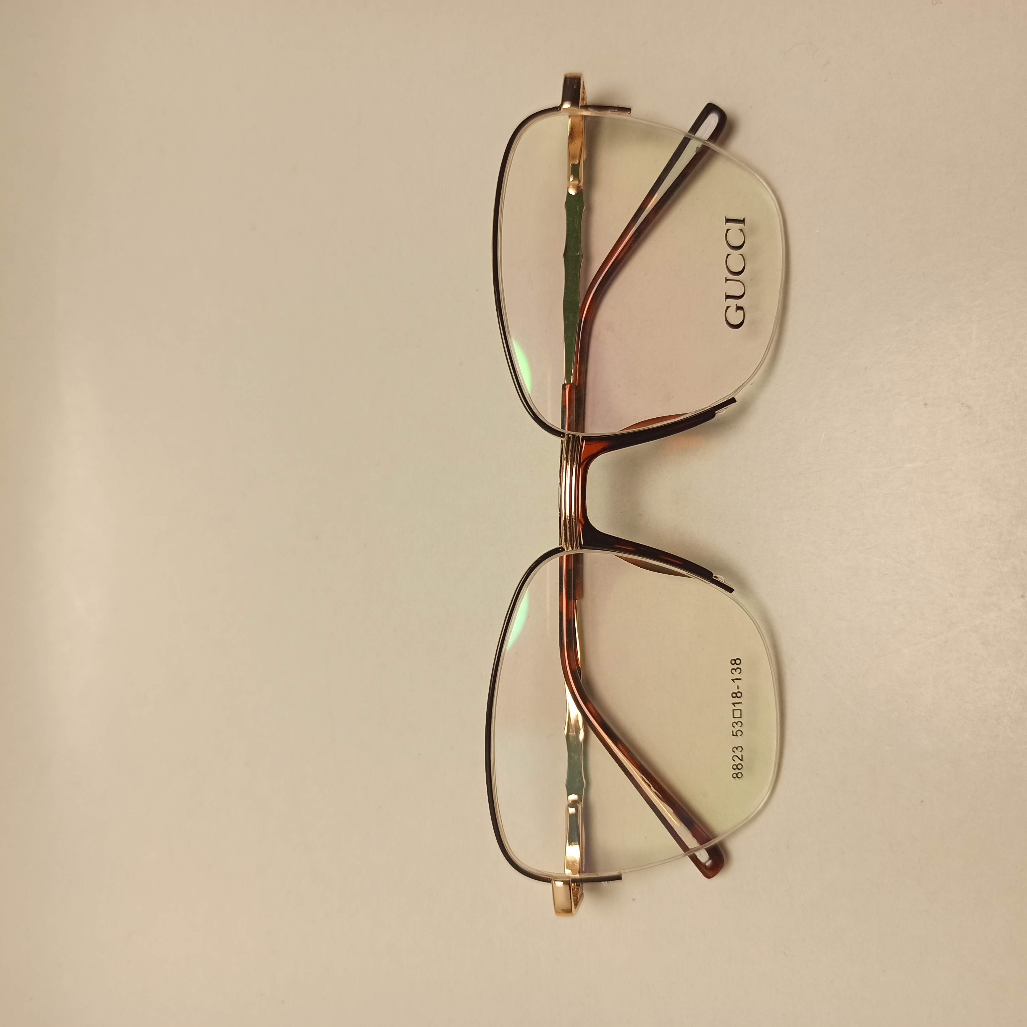 عینک طبی زنانه فلزی پد یک تیکه برند GUCCI کد 8823